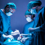 Foot & ankle surgeon operating surgery In Opearation room