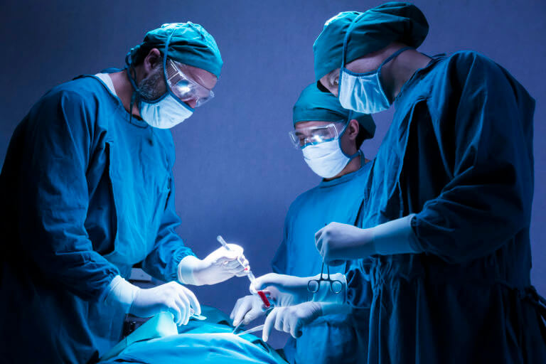 Foot & ankle surgeon operating surgery In Opearation room